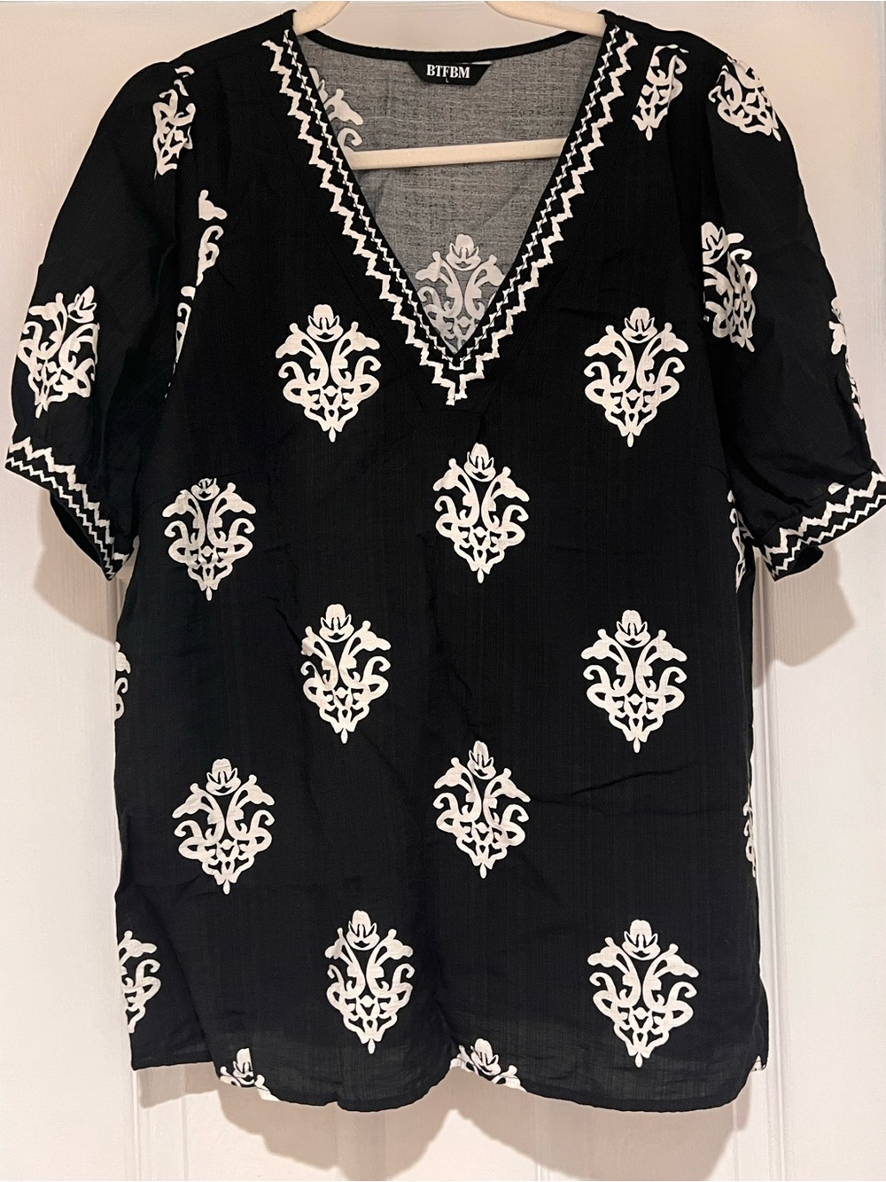 Black and White V-Neck Women’s Top